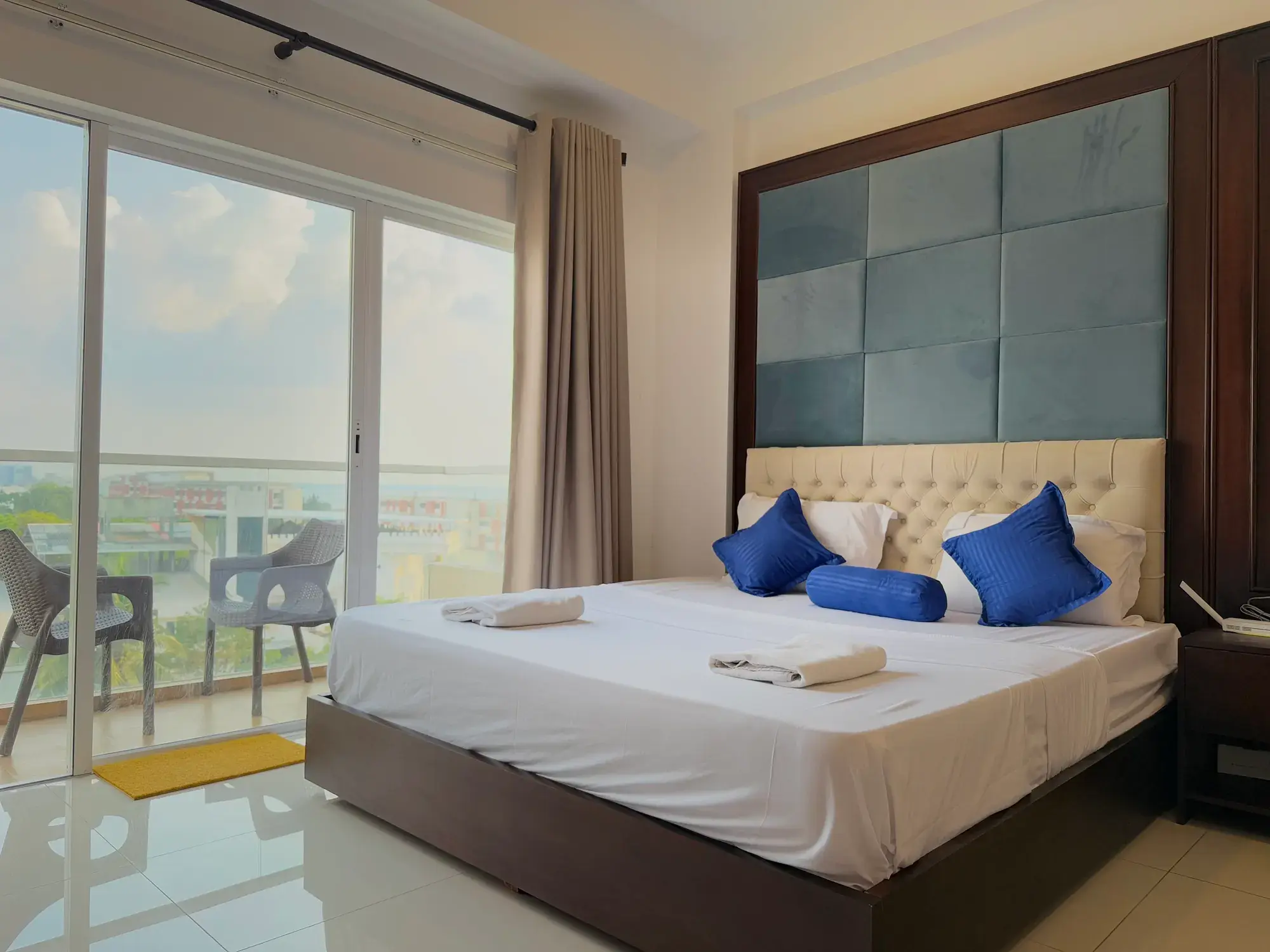 Bedroom with sliding doors to the balcony
