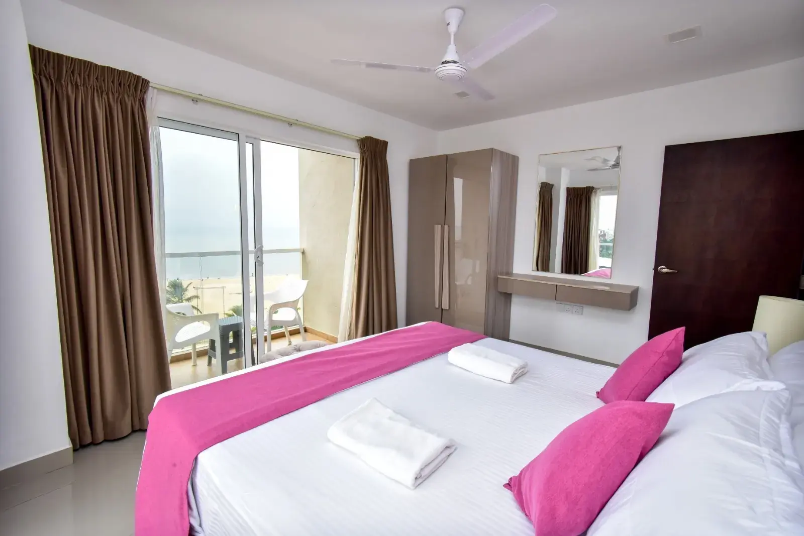 Bedroom with balcony doors